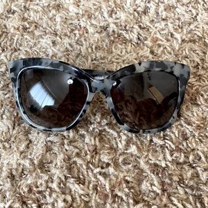 Grey and Black tortoise shell sunglasses
